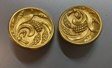 2 grandi bottoni dorati -
