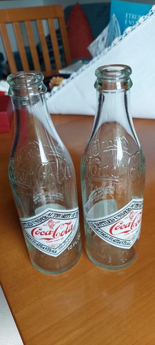 Bottiglie coca cola - di,