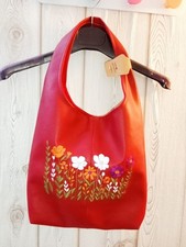 Borsa in ecopelle ricamata