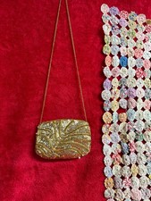 Pochette piccola con paillettes tono oro e argento con cinturino lungo sottile