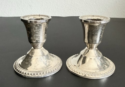 Coppia candelabri pesati - di,