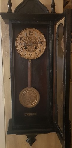 Antico orologio pendolo parete