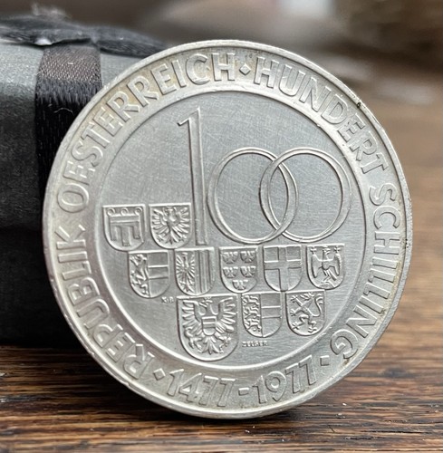 100 scellini commemorativi
