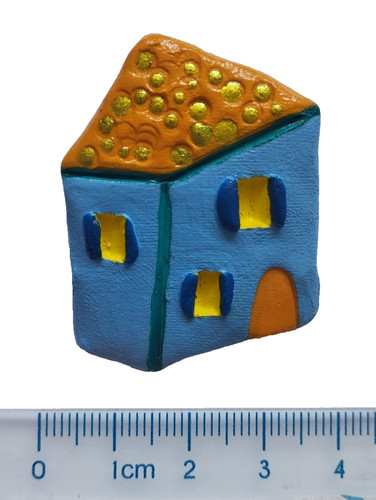 Spilla ceramica fatta a - in,