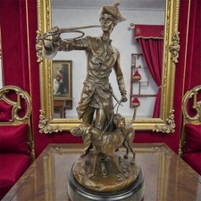 Statua in bronzo cani