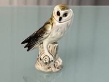 Statua cane Goebel uccellino