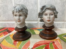 coppia di statuine busti