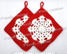 Coppia di presine all'uncinetto a tema di natalizio