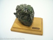 Scultura con testa di Indios