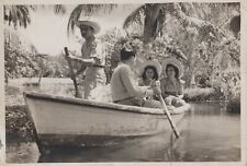 CUBAN SCENE ROWING BOAT IN A