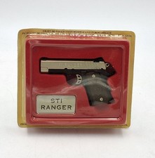 PISTOLE & REVOLVER " STI