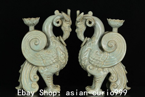 Coppia candelabri animali