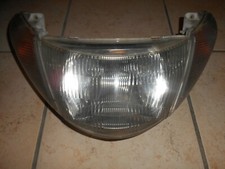 Faro anteriore con frecce