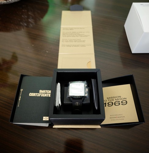 Swatch omega mission - swatch,