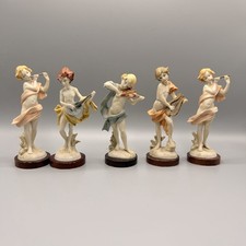 Set 5 statuine musicista