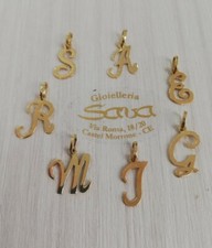 Lettera iniziale medaglia