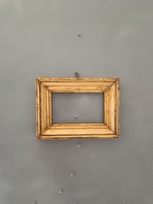 Cornice antica dorata in legno