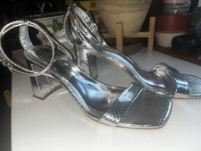 Next tacco argento con