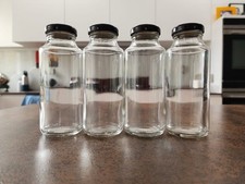 Set 4 bottiglie in vetro