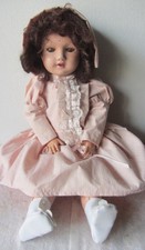 Antica bambola -  giocattolo