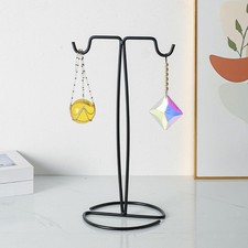 Espositore per borse con ganci