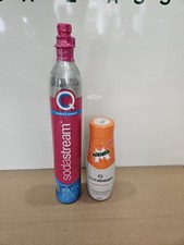  BOMBOLA CO2 SODASTREAM  CON CONCENTRATO ARANCIA, CON RESO DELA BOMBOLA VUOTA 