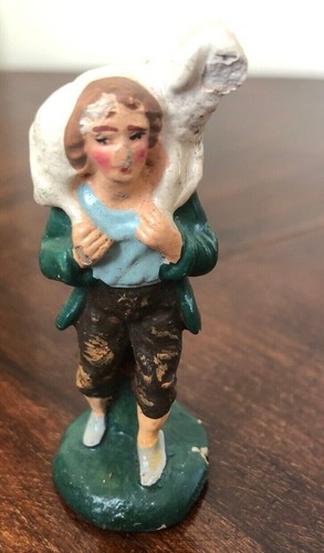 Statuina presepe giovane con - giovane,