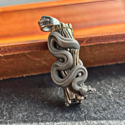 Ciondolo serpente ottone
