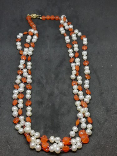 Collana tre fili con - a,