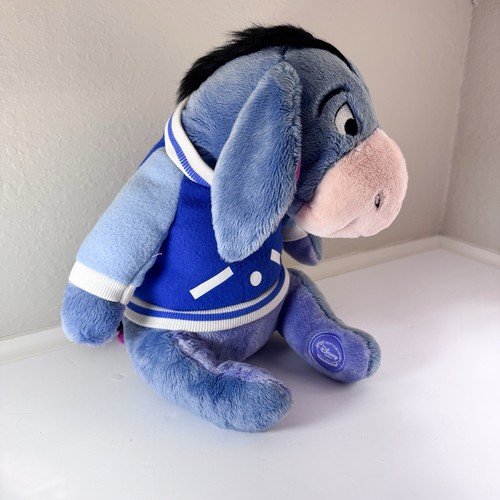 Disney store seduto - store, occhiello