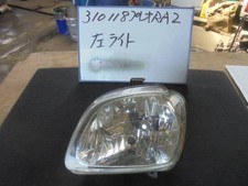 Faro proiettore sinistro