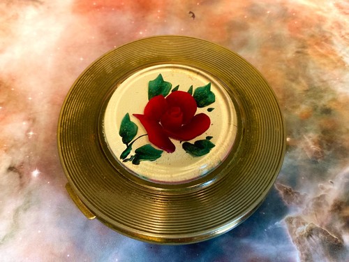 Flower behind lucite - , mascot