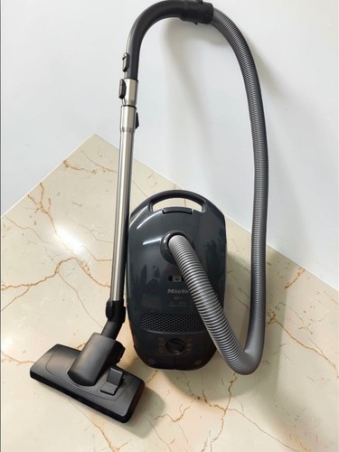 Aspirapolvere compatto - , a