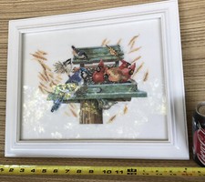 Alimentatore per uccellini