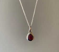 Ciondolo design granato fatto