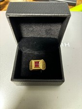 ANELLO DA UOMO IN ORO GIALLO 18 KT CON RUBINO