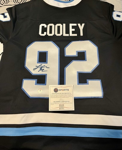 Logan cooley signed jersey - logan,
