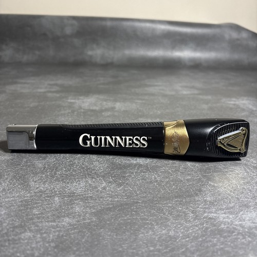 Guinness beer tap handle man - guinness,
