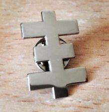 Spilla croce tv psichica. Genesis Breyer P-Orridge. Griglia palpitante