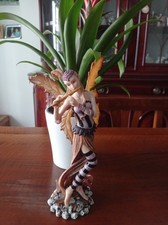 statuina in resina Les Alpes