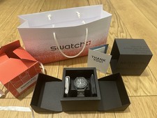 omega swatch mission to