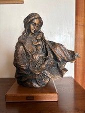 Statua in bronzo donna con