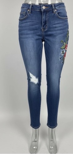 Jeans skinny strappati