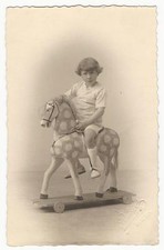 ADORABLE CHILD ON A PAINTED