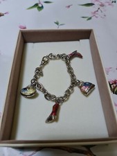 Bracciale in argento 925 con borse e stivali smaltati