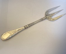 A Solid Silver Handled Bread
