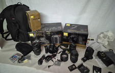 Nikon D 5000 kit pacchetto accessori extra Tamron obiettivo flash impugnatura batteria zaino