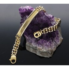 BRACCIALE DA UOMO IN ORO GIALLO E  BIANCO  750/1000. ,  18 KT