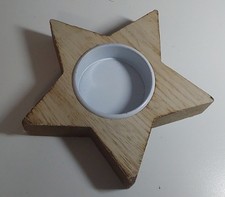 PORTACANDELA A FORMA DI STELLA