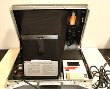 vecchio PROIETTORE MOVIE TAPE BELL & HOWELL  1152 con valigetta sansonite